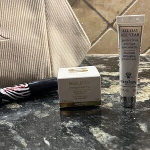 Sisley All Day All Year, Anit-Age Fresh Gel, and Phyto  Lip #16 travel set